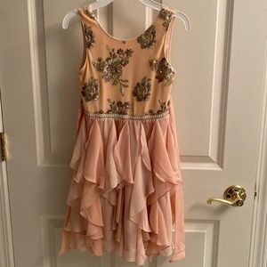 Girls pink/peach holiday dress worn once. In great condition